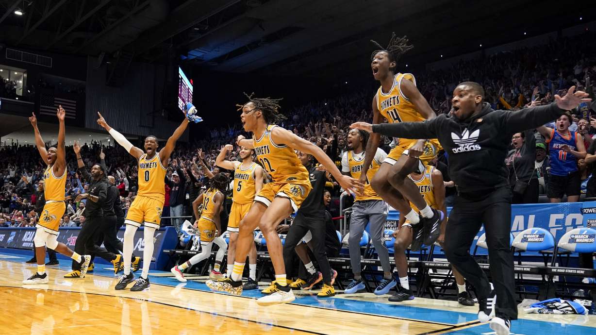 Alabama State players react to a TJ Madlock basket during the second half of a First Four college basketball game against Saint Francis in the NCAA Tournament, Tuesday, March 18, 2025, in Dayton, Ohio.