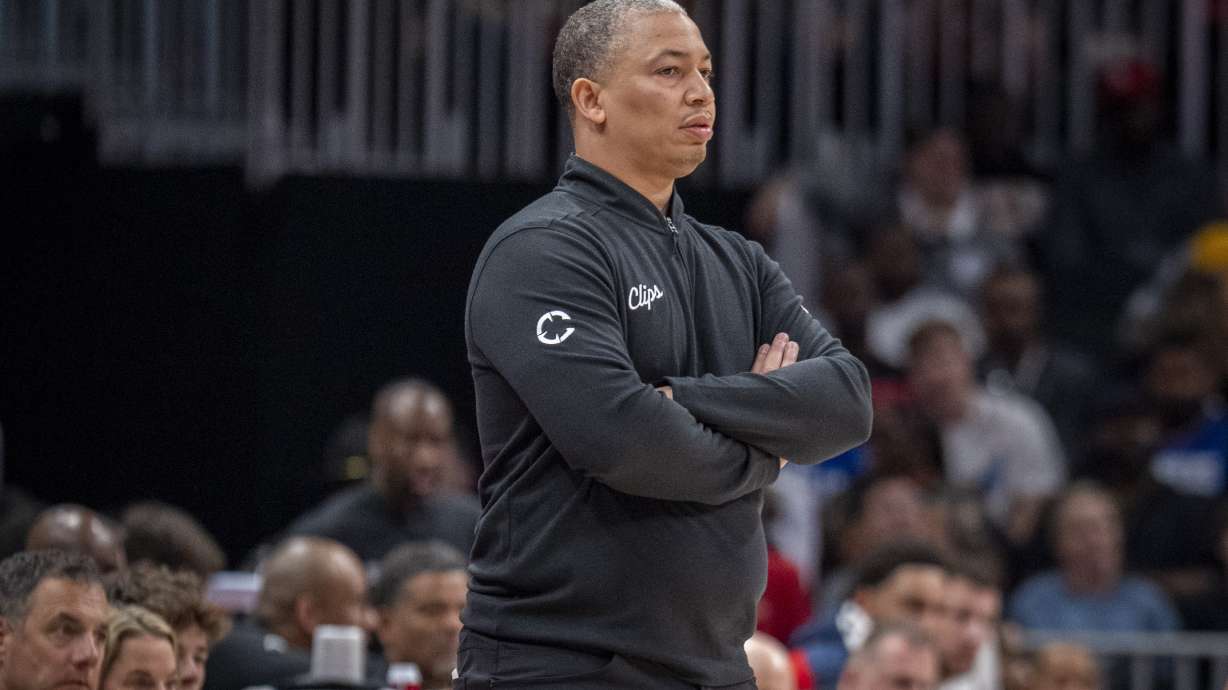 Los Angeles Clippers head coach Tyronn Lue stands on the court during the first half of an NBA basketball game against the Atlanta Hawks, Friday, March 14, 2025, in Atlanta.