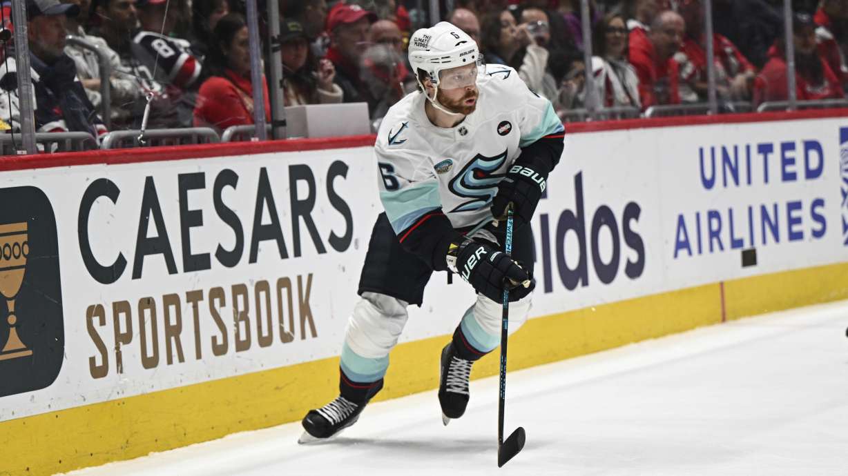 Seattle Kraken defenseman Adam Larsson (6) skates with the puck during the first period of an NHL hockey game against the Washington Capitals, Sunday, March 9, 2025, in Washington.