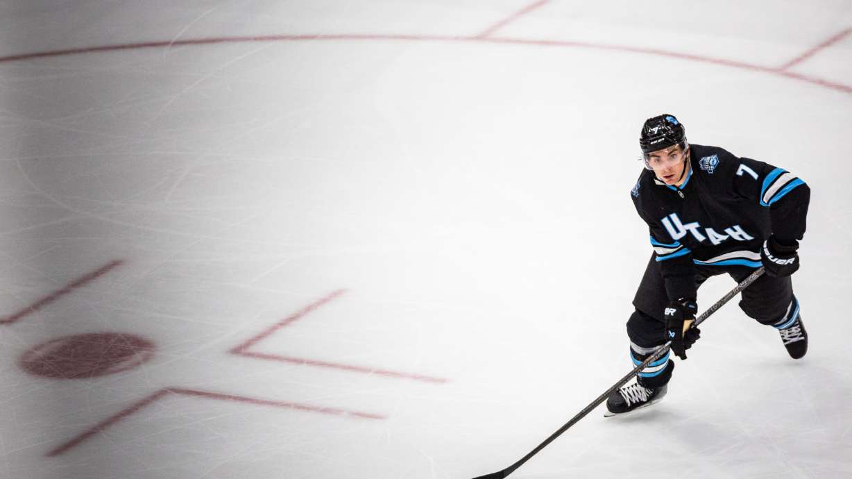 Utah Hockey Club defenseman Michael Kesselring (7) takes possession of the puck during an NHL game held at the Delta Center in Salt Lake City on Sunday, Feb. 2, 2025.