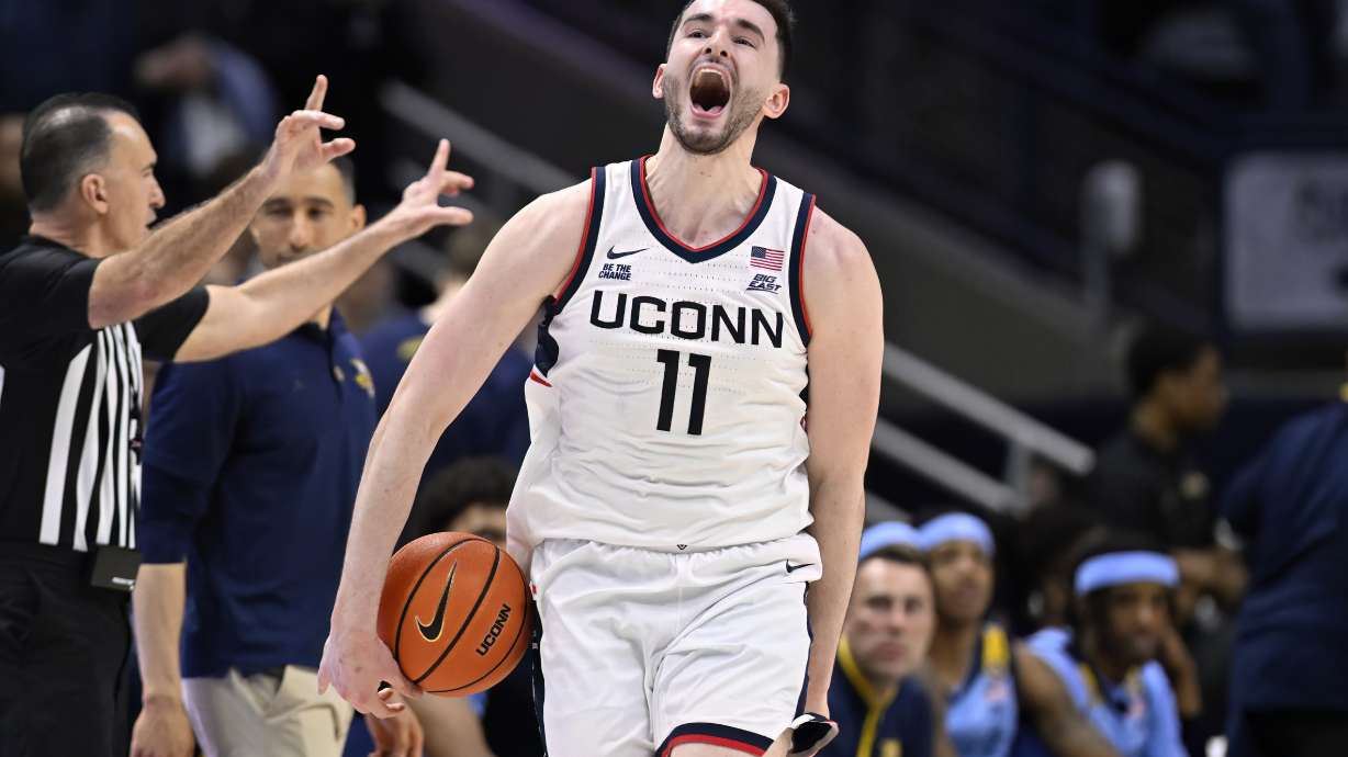 UConn forward Alex Karaban (11) reacts at the end of an NCAA basketball game against Marquette, Wednesday, March 5, 2025, in Storrs, Conn.