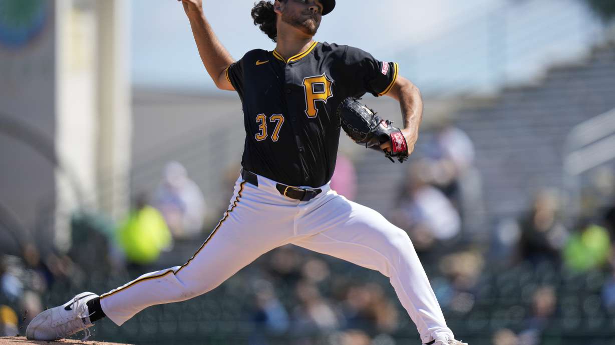 Pittsburgh Pirates starting pitcher Jared Jones (37) delivers during the first inning of a spring training baseball game against the Atlanta Braves, Tuesday, Feb. 25, 2025, in Bradenton, Fla.
