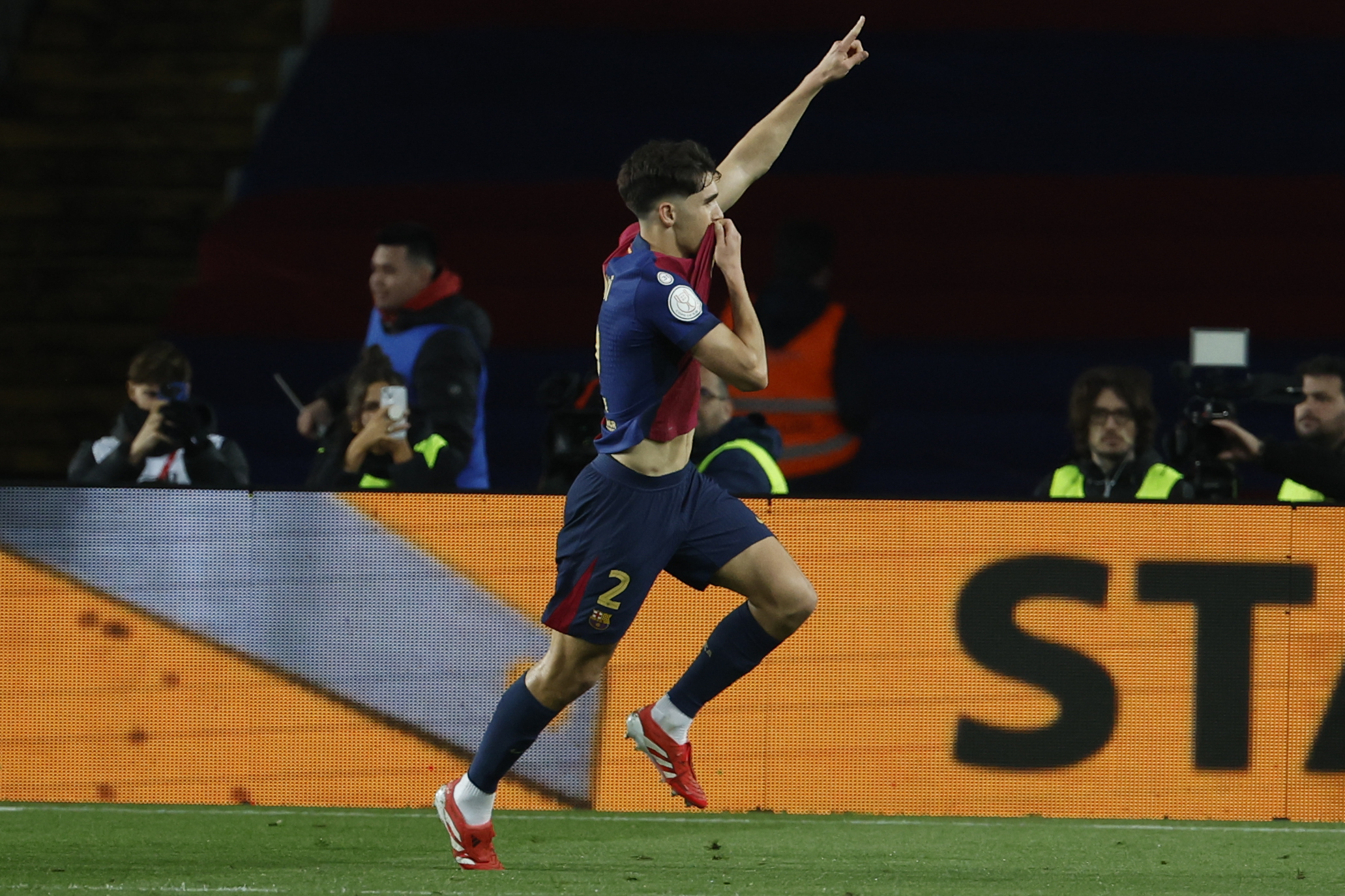Barcelona's Pau Cubarsi celebrates after a goal during a Spanish Copa del Rey, or King's Cup, the semi-final soccer match between Barcelona and Atletico Madrid in Barcelona, Spain, Tuesday, Feb. 25, 2025. AP Photo/Joan Monfort)