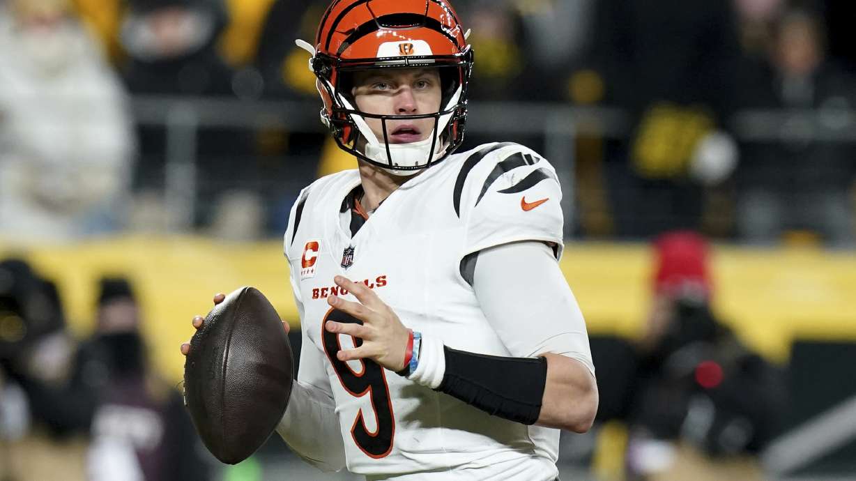 Cincinnati Bengals quarterback Joe Burrow (9) looks to throw during the first half of an NFL football game against the Pittsburgh Steelers Saturday, Jan. 4, 2025, in Pittsburgh.