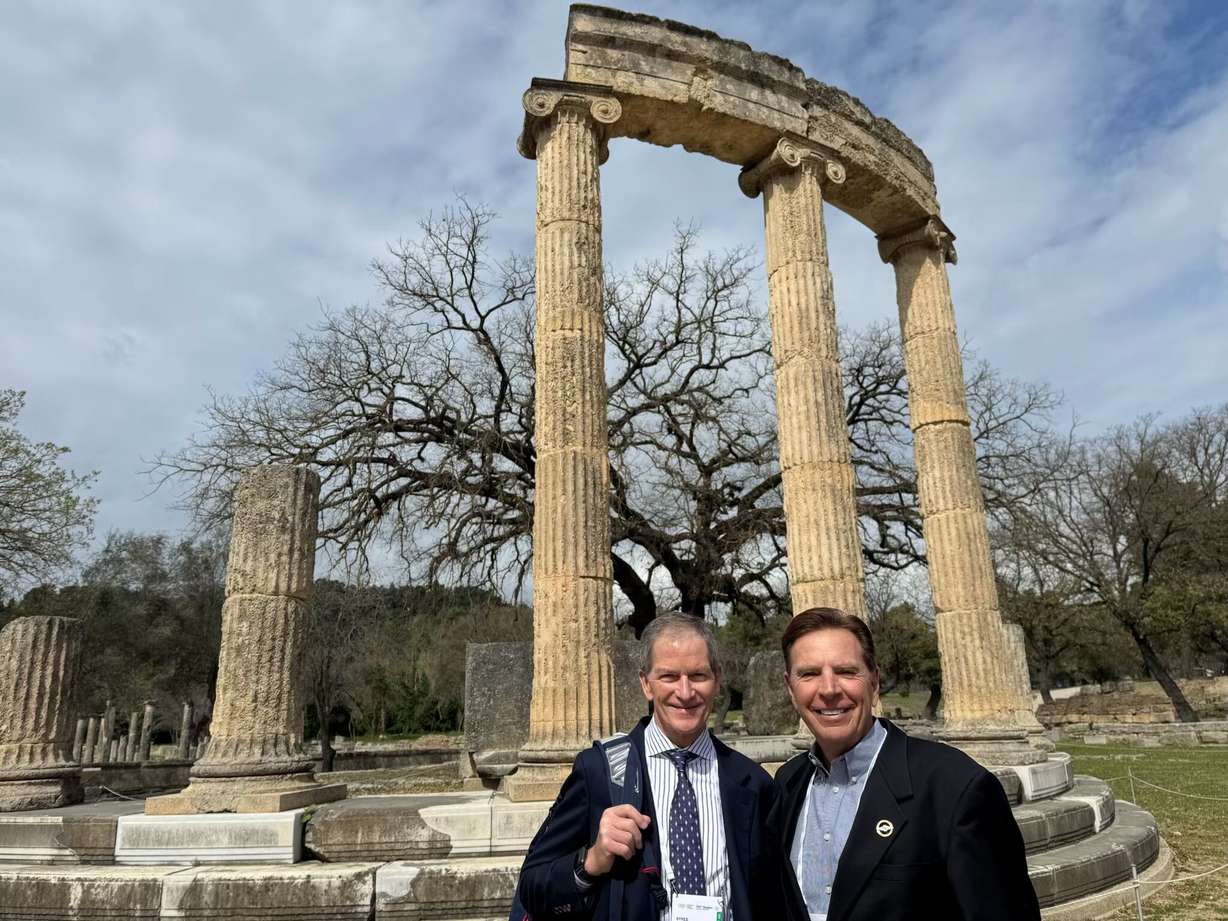 Gene Sykes, U.S. Olympic and Paralympic chair and International Olympic Committee member, is pictured with Fraser Bullock, president and executive chair of Utah’s 2034 Winter Games organizing committee at the Temple of Zeus in Olympia, Greece, in an undated photo.
