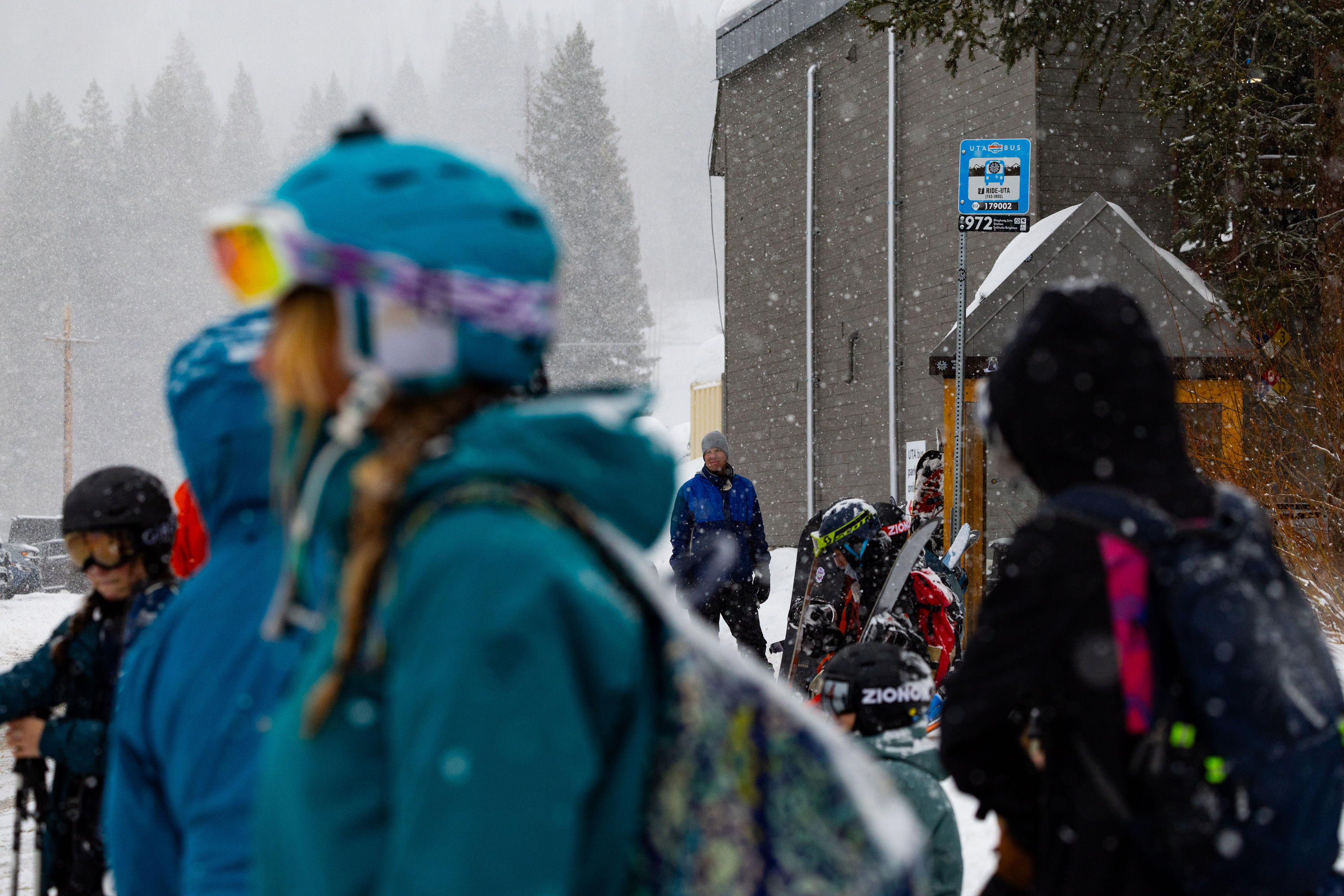 Skiers and snowboarders wait for the bus at Brighton Resort in Big Cottonwood Canyon on Jan. 20, 2024. A 55-year-old died Wednesday at Park City after being buried in snow, though the cause is still unclear.