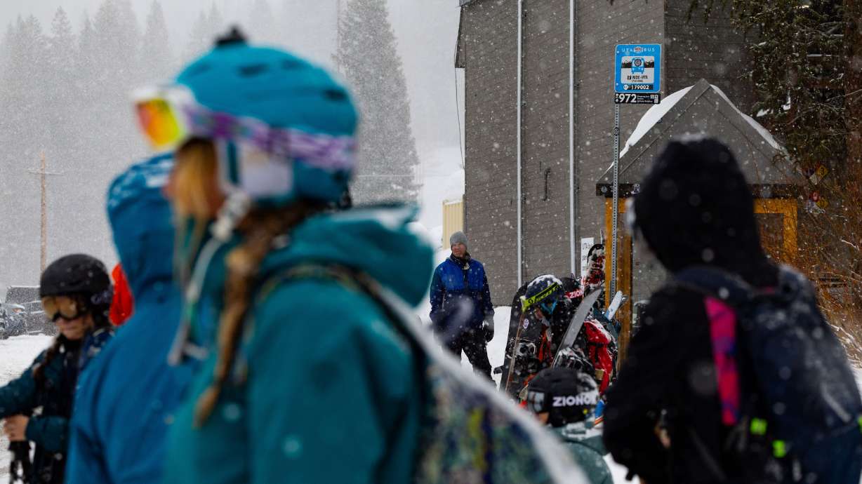 Skiers and snowboarders wait for the bus at Brighton Resort in Big Cottonwood Canyon on Jan. 20, 2024. A 55-year-old died Wednesday at Park City after being buried in snow, though the cause is still unclear.