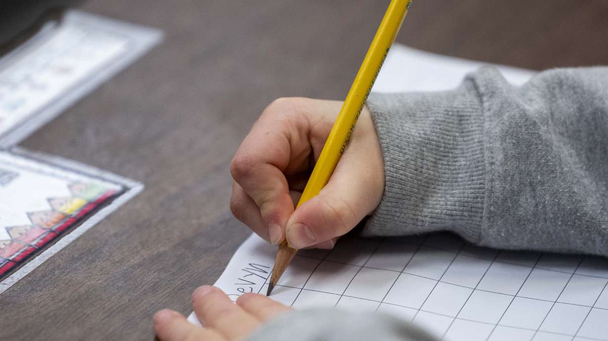 Students work on coursework at Crescent Elementary School in Sandy on Jan. 13. Here's what the Utah State Board of Education and tech giant Qualtrics are doing to transform K-12 education.