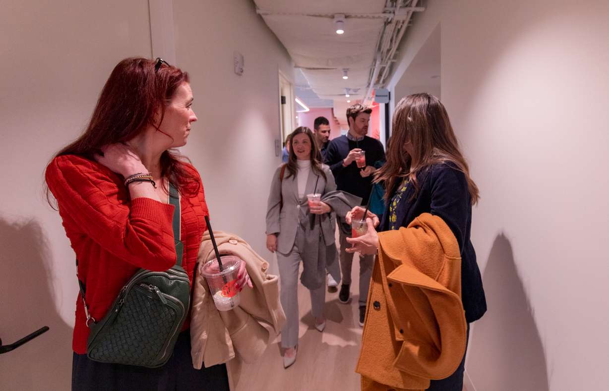 Utah Rep. Jennifer Dailey-Provost, D-Salt Lake City, Salt Lake City Mayor Erin Mendenhall and other local leaders tour Trü Frü's new downtown Salt Lake City office at 170 S. Main on Wednesday.