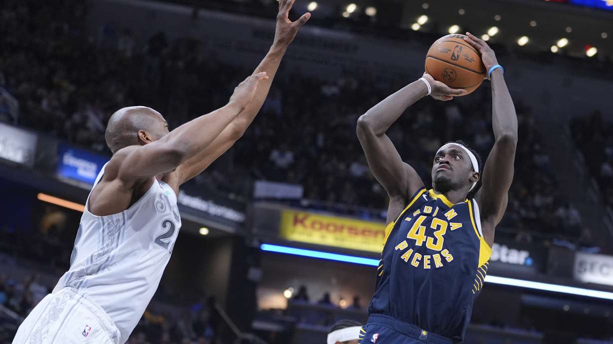 Indiana Pacers forward Pascal Siakam (43) shoots over Dallas Mavericks forward Kai Jones (23) during the second half of an NBA basketball game in Indianapolis, Wednesday, March 19, 2025.