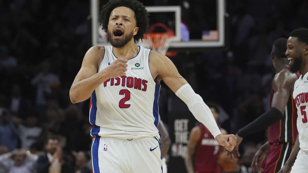 Detroit Pistons guard Cade Cunningham (2) celebrates after scoring the winning basket during the second half of an NBA basketball game against the Miami Heat, Wednesday, March 19, 2025, in Miami.