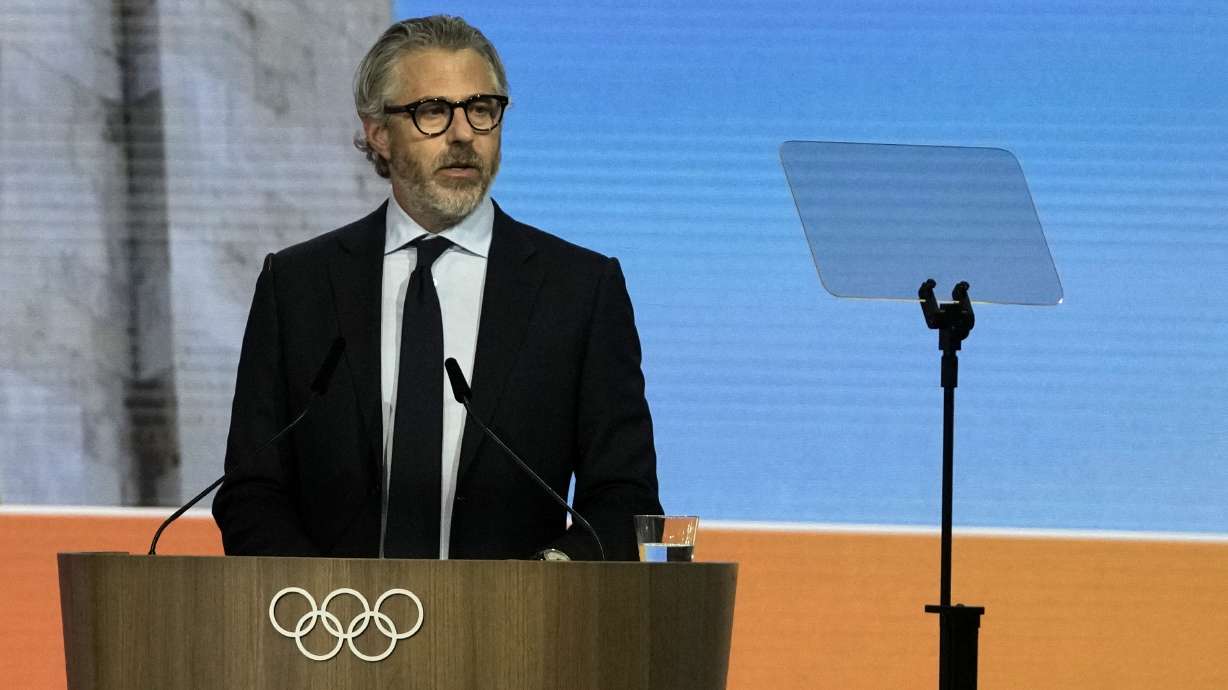 Casey Wasserman, chairman of the 2028 Los Angeles Olympics organizing committee, speaks during the 144th International Olympic Committee session, which will elect the new IOC President, in Costa Navarino, western Greece, Thursday, March 20, 2025.