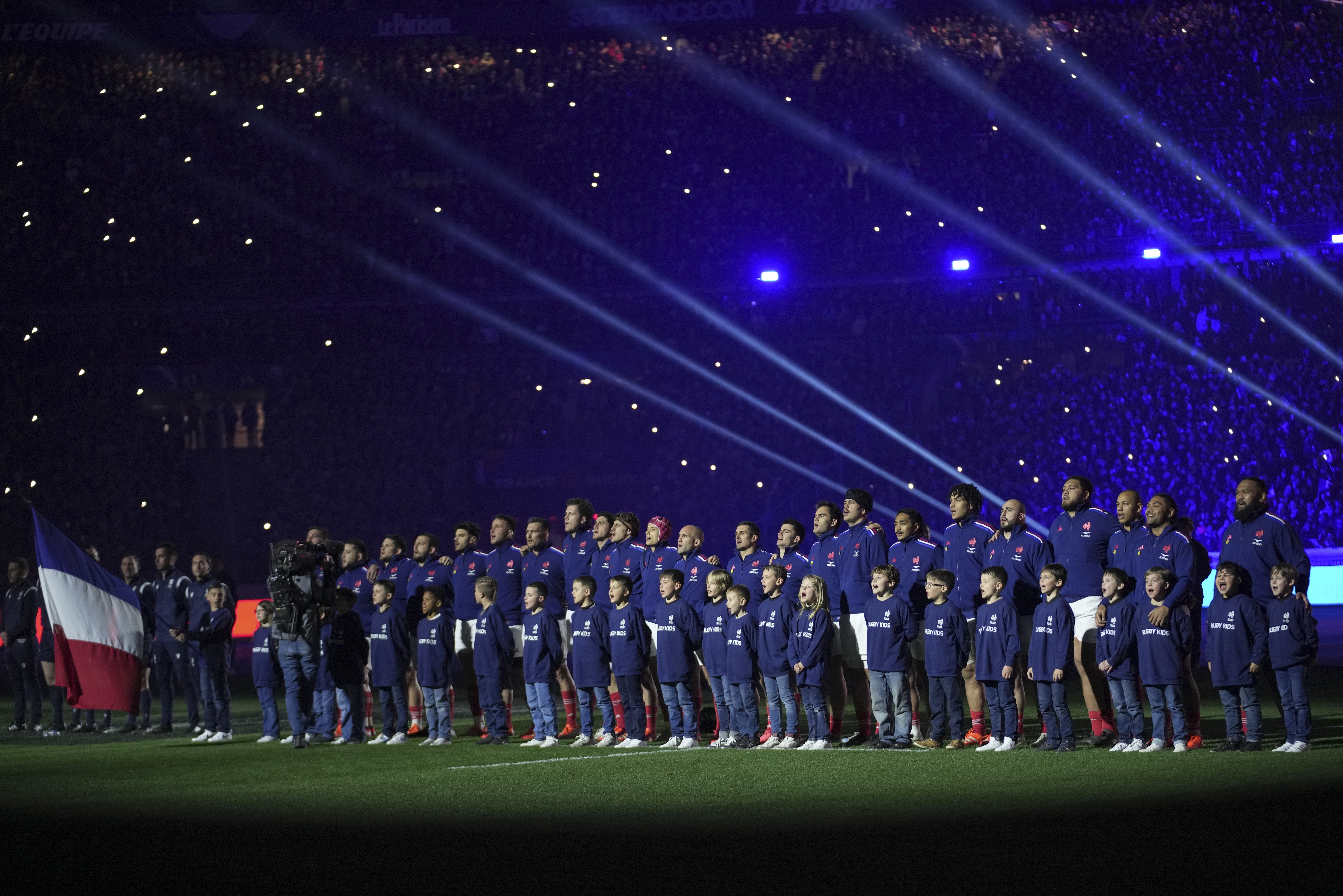 France's team line-up for the anthem before the Six Nations rugby union match between France and Scotland at the Stade de France in Saint-Denis, outside Paris, Saturday, March 15, 2025.