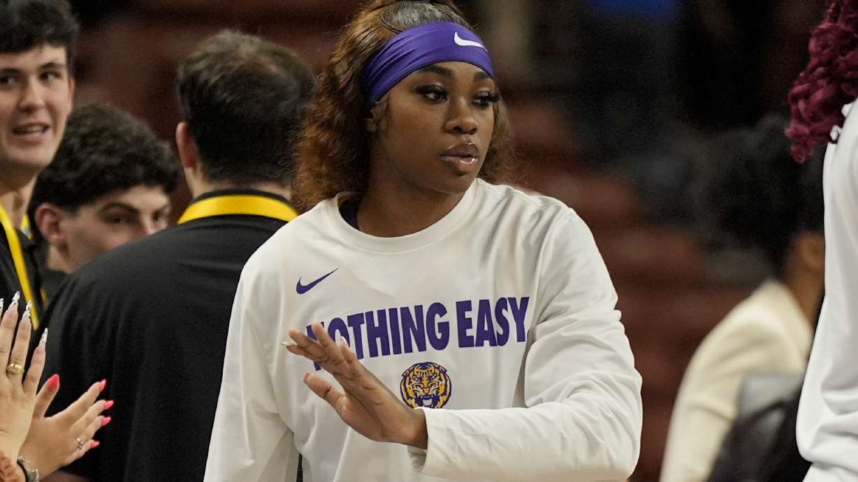 LSU guard Aneesah Morrow walks off the court after an NCAA college basketball game against Texas in the semifinals of the Southeastern Conference tournament, Saturday, March 8, 2025, in Greenville, S.C. Morrow was injured during the second hal.f