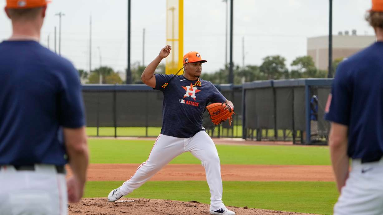 FILE - Houston Astros pitcher Luis Garcia takes part in a drill during a spring training baseball practice Sunday, Feb. 16, 2025, in West Palm Beach, Fla.