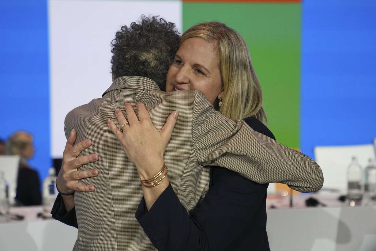 Anita DeFrantz hugs Kirsty Coventry after her election as IOC President in Costa Navarino, western Greece, March 20. Coventry was on hand for DeFrantz's induction into the U.S. Olympic and Paralympic Hall of Fame Saturday.