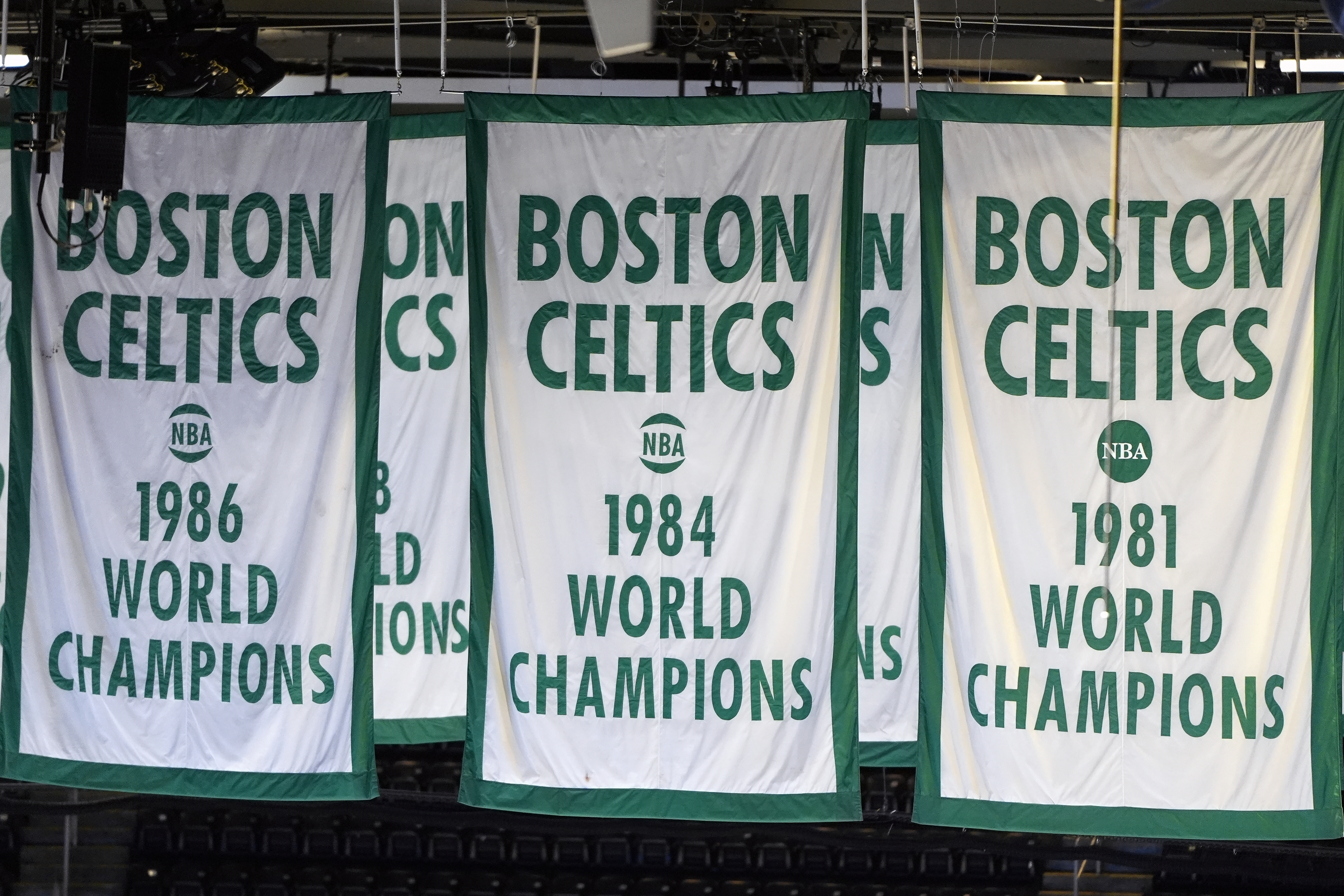 FILE - Boston Celtics' NBA championship banners hang from the rafters at TD Garden, Wednesday, March. 27, 2024, in Boston.