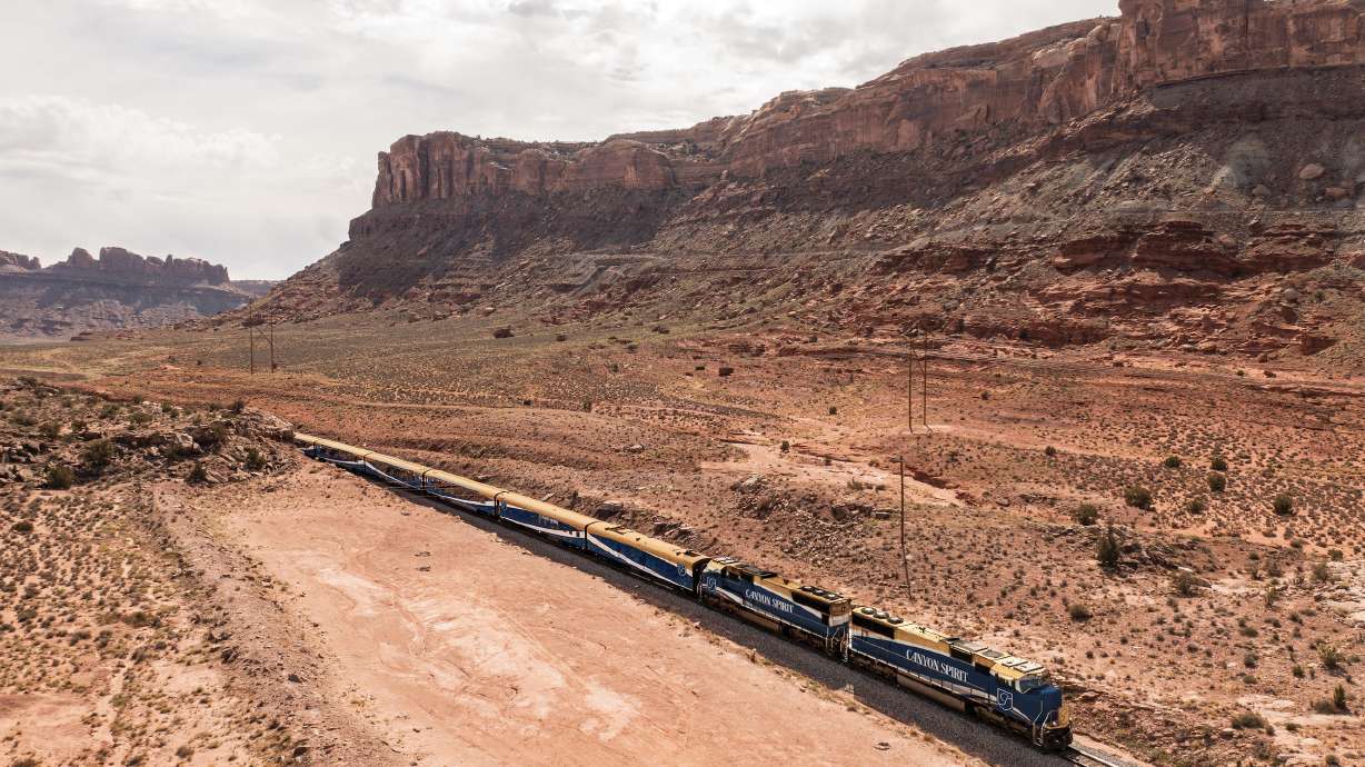 A rendering of the exterior of the new Canyon Spirit train as it passes through southeast Utah. The luxury train service will include Salt Lake City beginning in 2026.