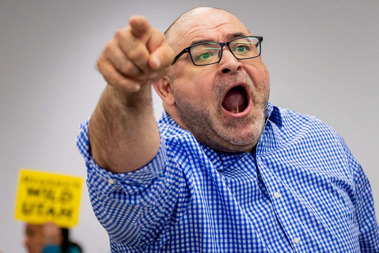 Mike Bretz speaks out at a Town Hall held by Reps. Celeste Maloy and Mike Kennedy on Thursday in Salt Lake City.