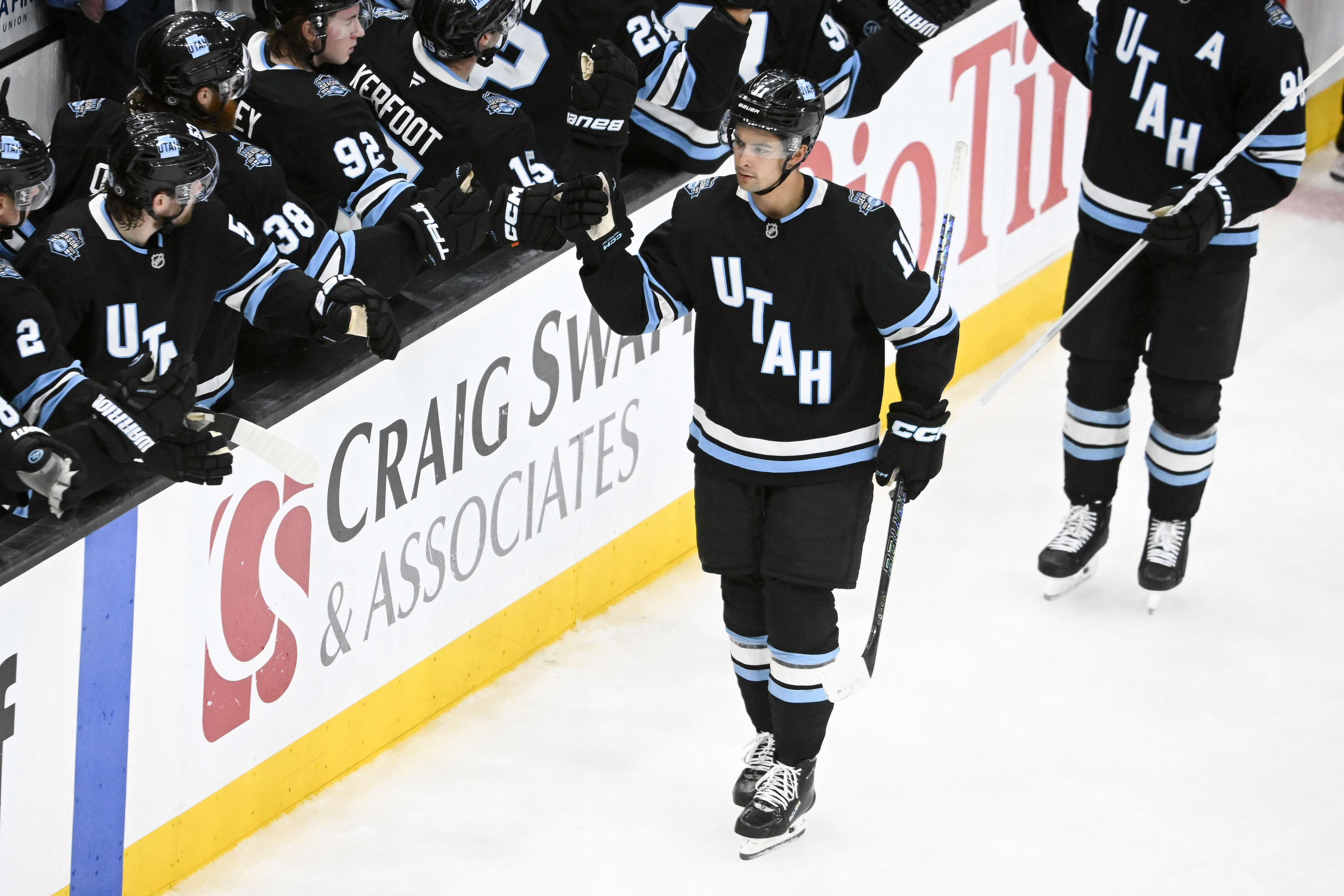 Utah Hockey Club right wing Dylan Guenther (11) celebrates a goal during the third period of an NHL hockey game against the Anaheim Ducks, Wednesday, March 12, 2025, in Salt Lake City.