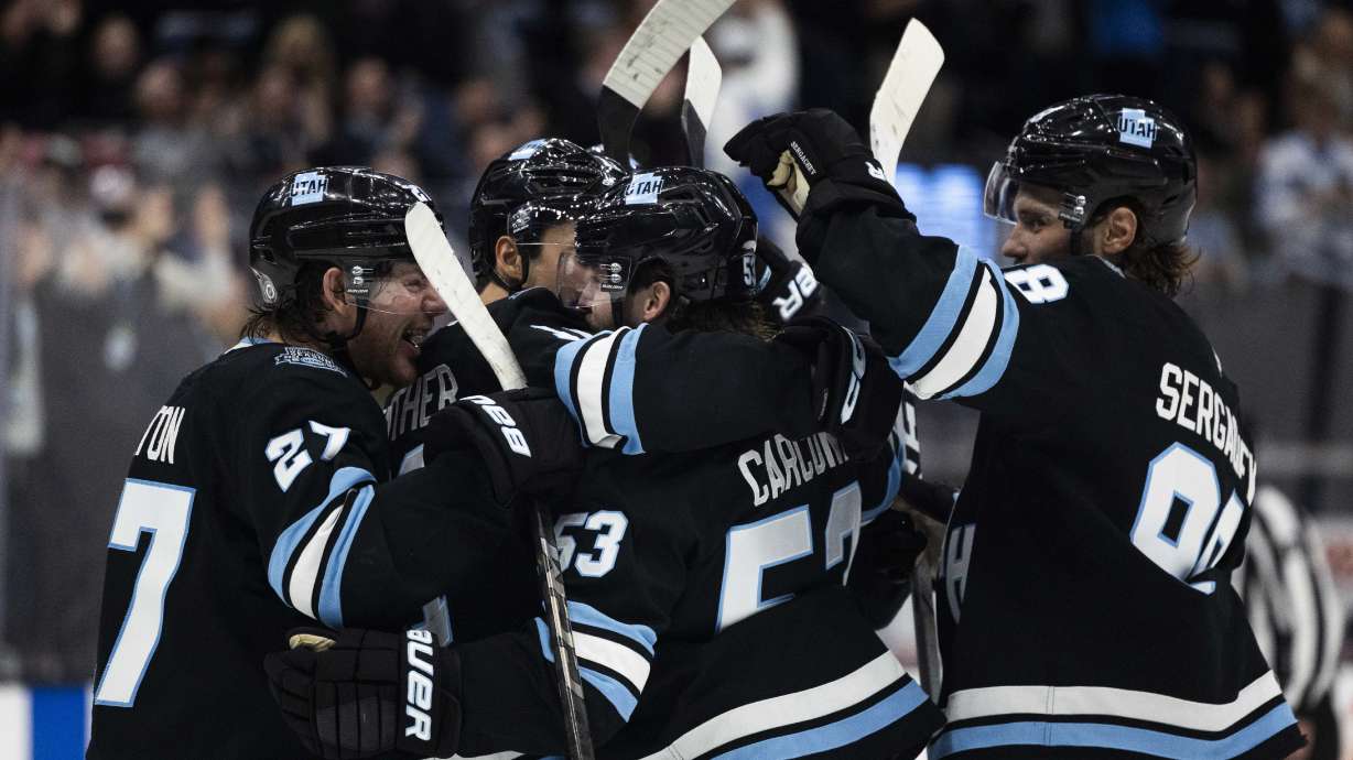 Utah Hockey Club players celebrate after scoring a goal against the Buffalo Sabres during an NHL game at the Delta Center in Salt Lake City on Thursday, March 20, 2025.