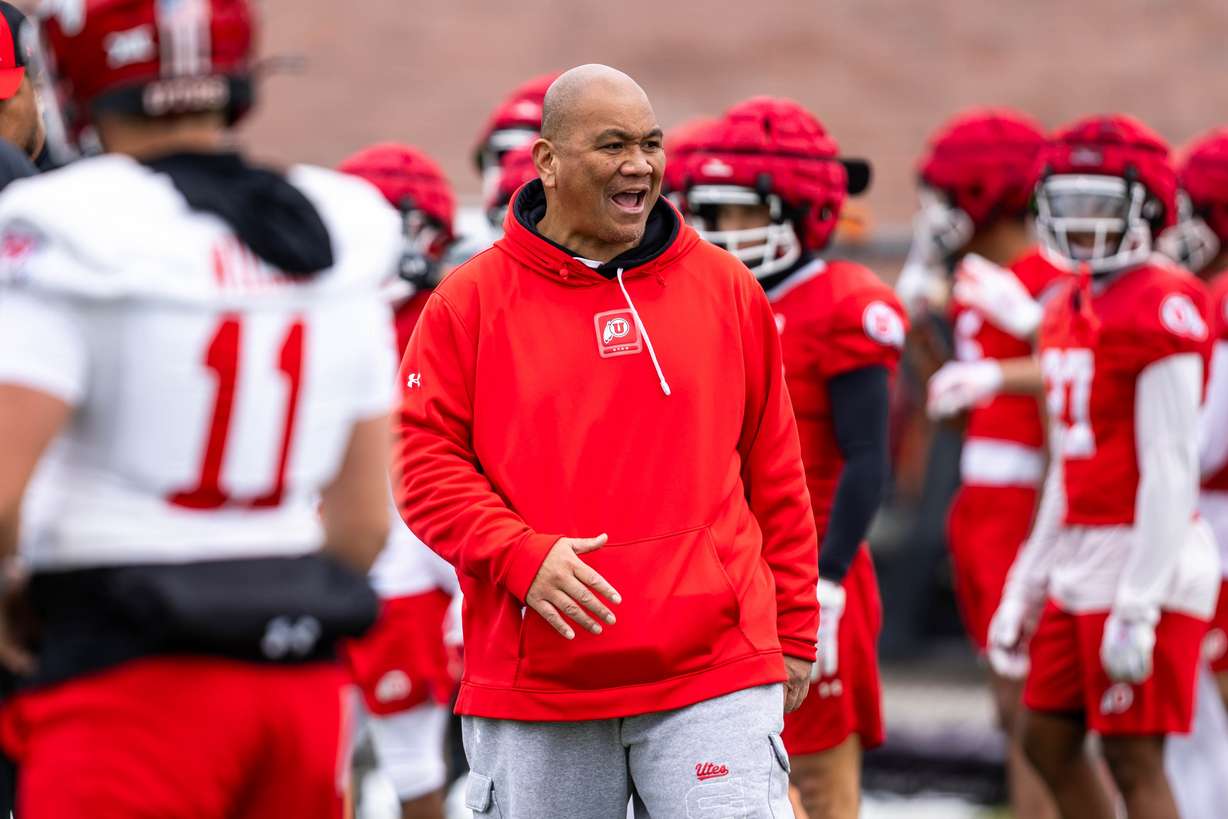 Utah running back coach Mark Atuaia coaches up his players during the team's spring football practice at Spence and Cleone Eccles Football Center in Salt Lake City on Thursday, March 20, 2025.