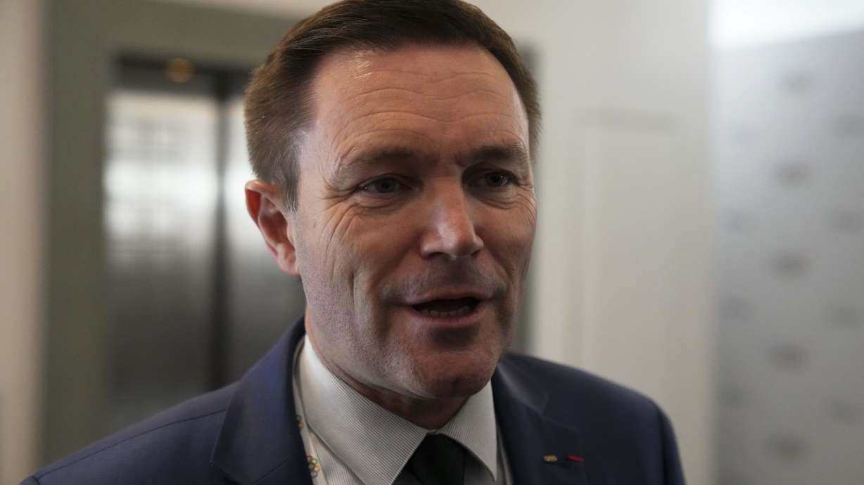 Candidate to the presidency of the International Olympic Committee David Lappartient makes statements to the reporters during a break of the 144th session, which will elect the new IOC President, in Costa Navarino, western Greece, Wednesday, March 19, 2025.