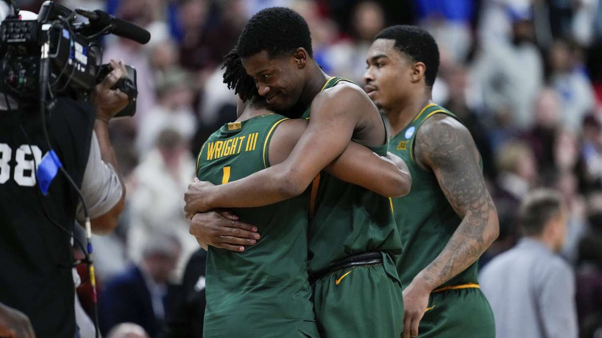 Baylor guard VJ Edgecombe, center, celebrates with guard Robert Wright III (1) after their team's victory over Mississippi State in the first round of the NCAA college basketball tournament, Friday, March 21, 2025, in Raleigh, N.C.