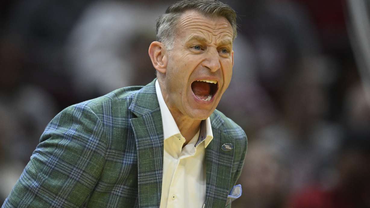 Alabama head coach Nate Oats shouts in the first half against Robert Morris in the first round of the NCAA college basketball tournament, Friday, March 21, 2025, in Cleveland.