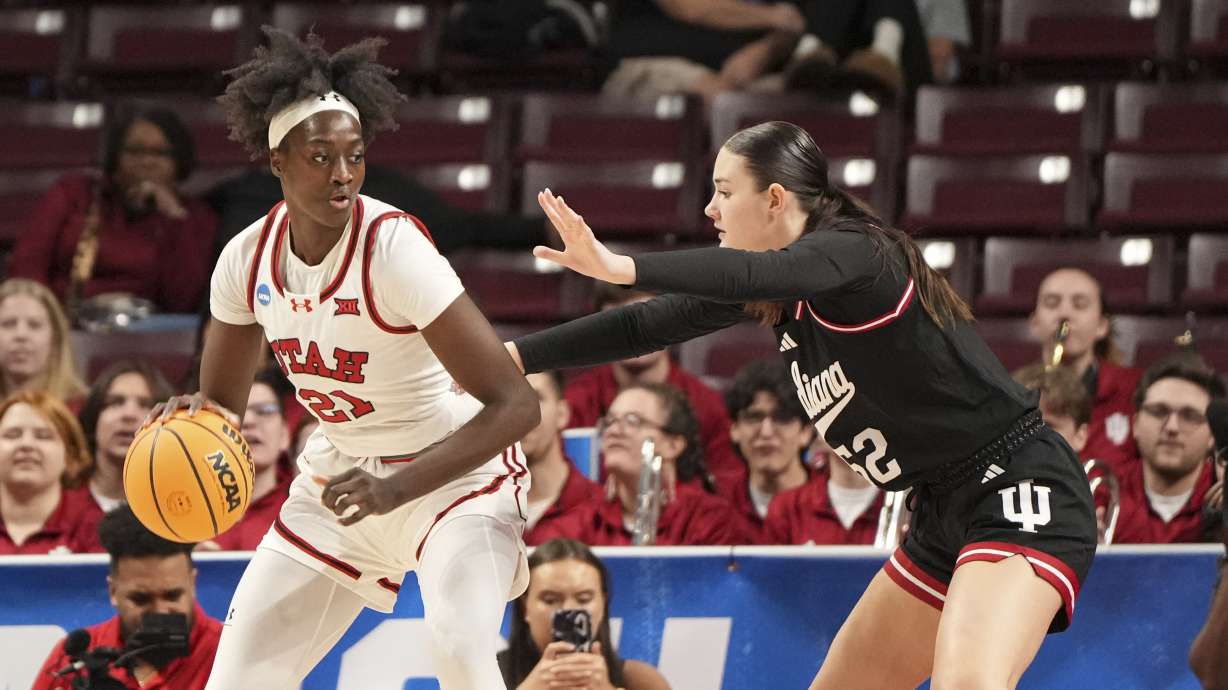 Indiana forward Lilly Meister (52) defends against Utah forward Maye Toure (21) during the first half in the first round of the NCAA college basketball tournament, Friday, March 21, 2025, in Columbia, S.C.