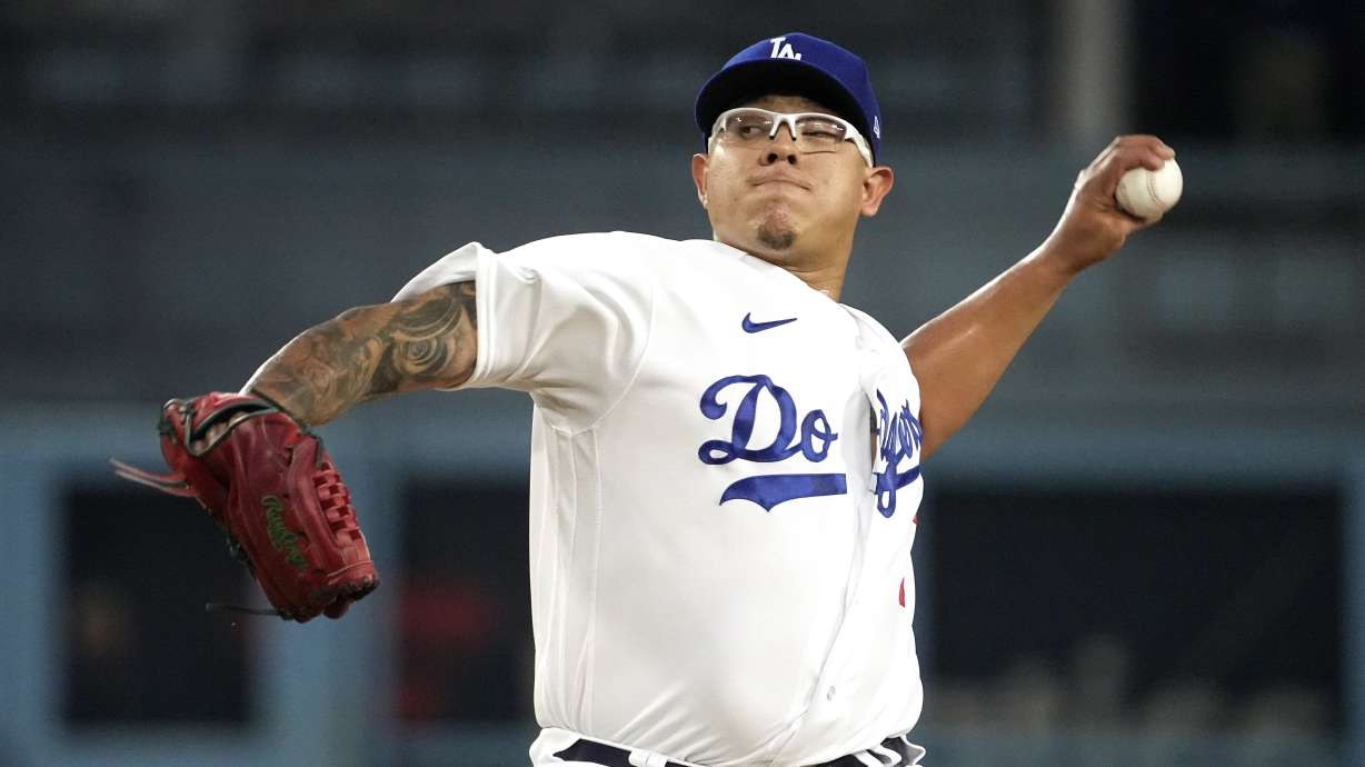 FILE - Los Angeles Dodgers starting pitcher Julio Urias throws to the plate during the first inning of a baseball game against the Atlanta Braves Friday, Sept. 1, 2023, in Los Angeles.