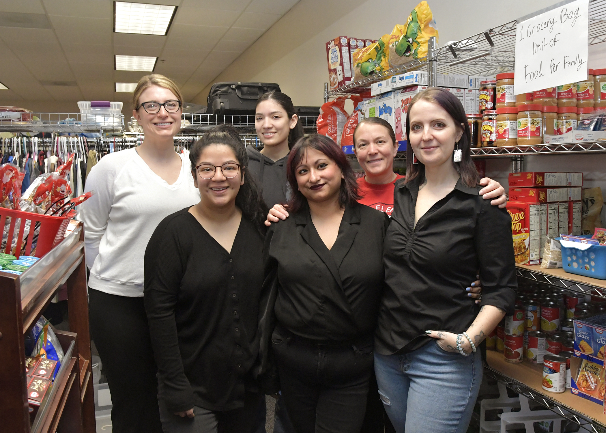 Stacey Fain, Liliana Simiskey, Jasmine Cisneros, Gabby McKee, Melissa Storms and Sharaya Woodwick pose at the Airman’s Attic on Feb. 25, at Hill Air Force Base.