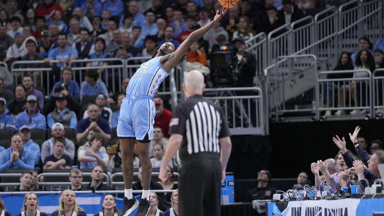 North Carolina forward Jae'Lyn Withers (24) attempts to catch an overthrown pass during the first half in the first round of the NCAA college basketball tournament against Mississippi, Friday, March 21, 2025, in Milwaukee, Wis.