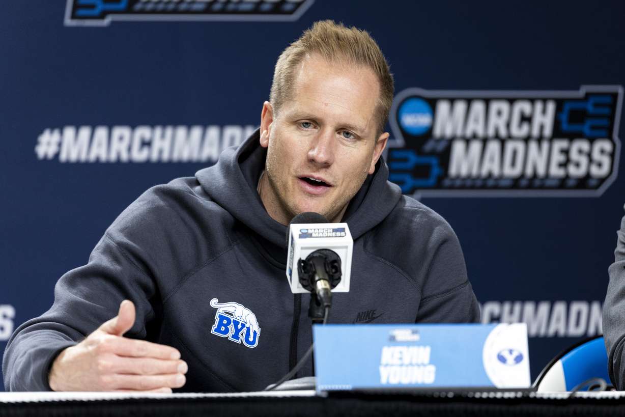 BYU Cougars head coach Kevin Young answers a question from a reporter during a press conference held at Ball Arena in Denver, Colo., on Friday, March 21, 2025.