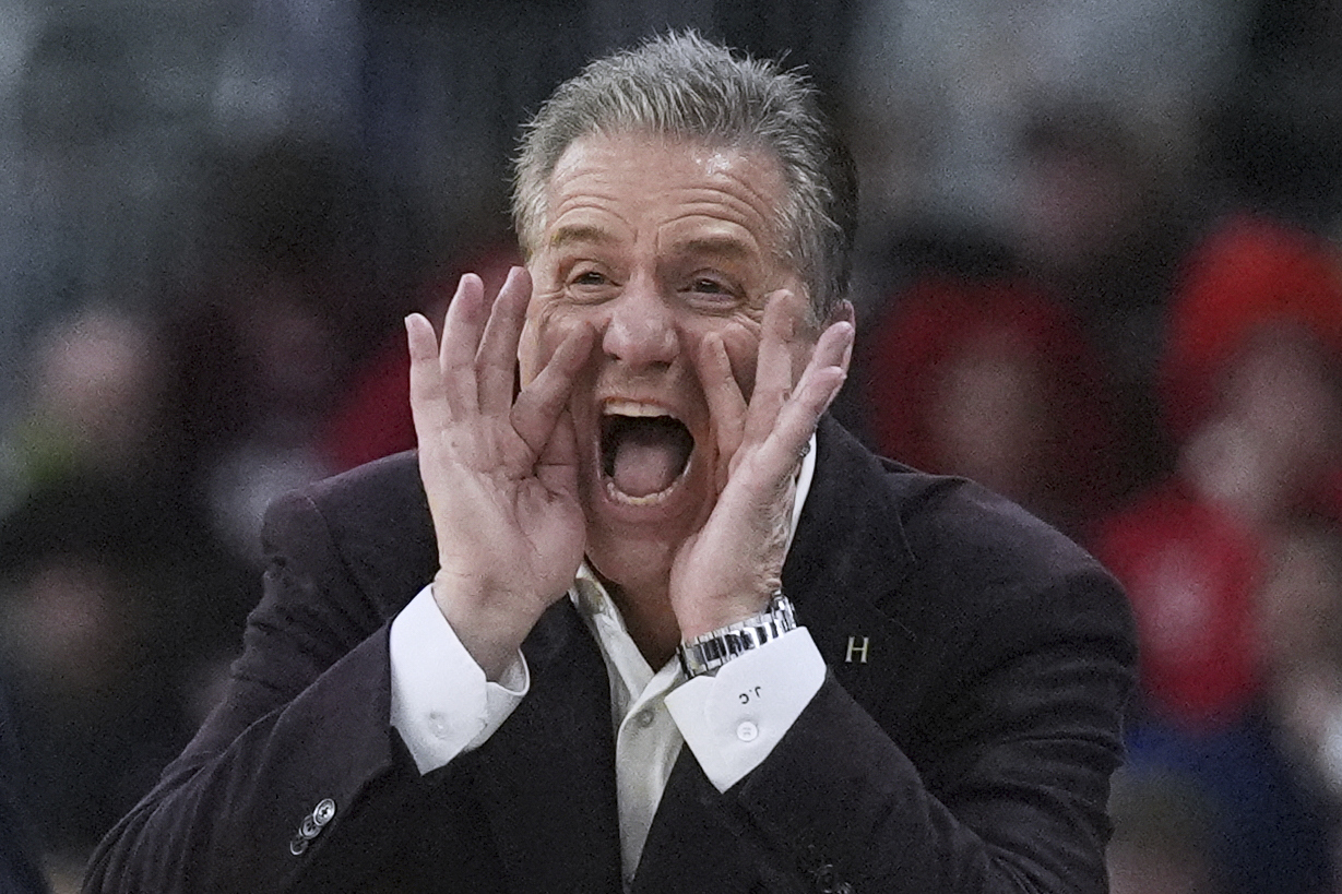 Arkansas head coach John Calipari calls to his players during the second half in the first round of the NCAA college basketball tournament, Thursday, March 20, 2025, in Providence, R.I.