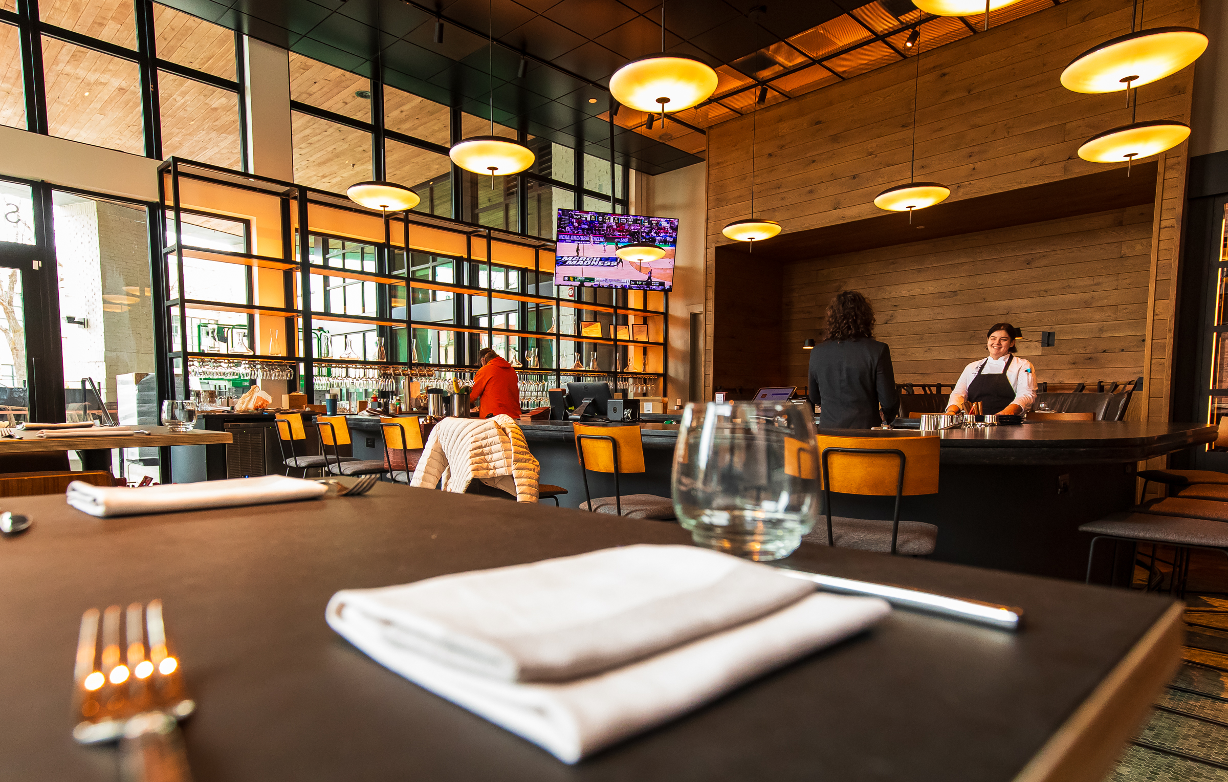 Hearth and Hill staff prepare ahead of a ribbon-cutting ceremony at the restaurant in Salt Lake City's Sugar House neighborhood on Friday. The restaurant is now open for business after a massive construction fire in 2022 delayed plans.