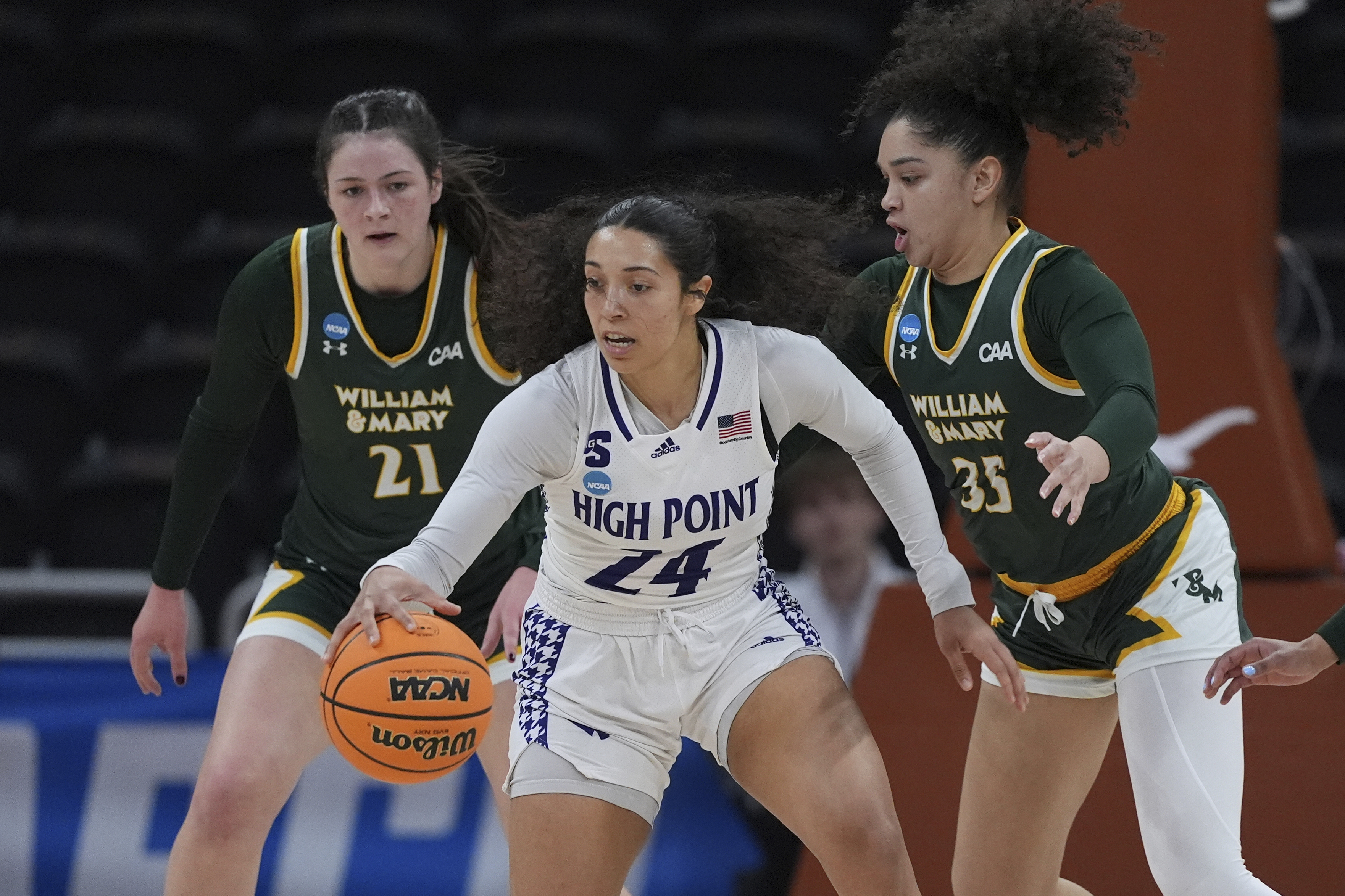High Point guard Jaleesa Lawrence (24) moves the ball past William & Mary forward Anahi-Lee Cauley (35) during the first half of a First Four college basketball game in the NCAA Tournament in Austin, Texas, Thursday, March 20, 2025.