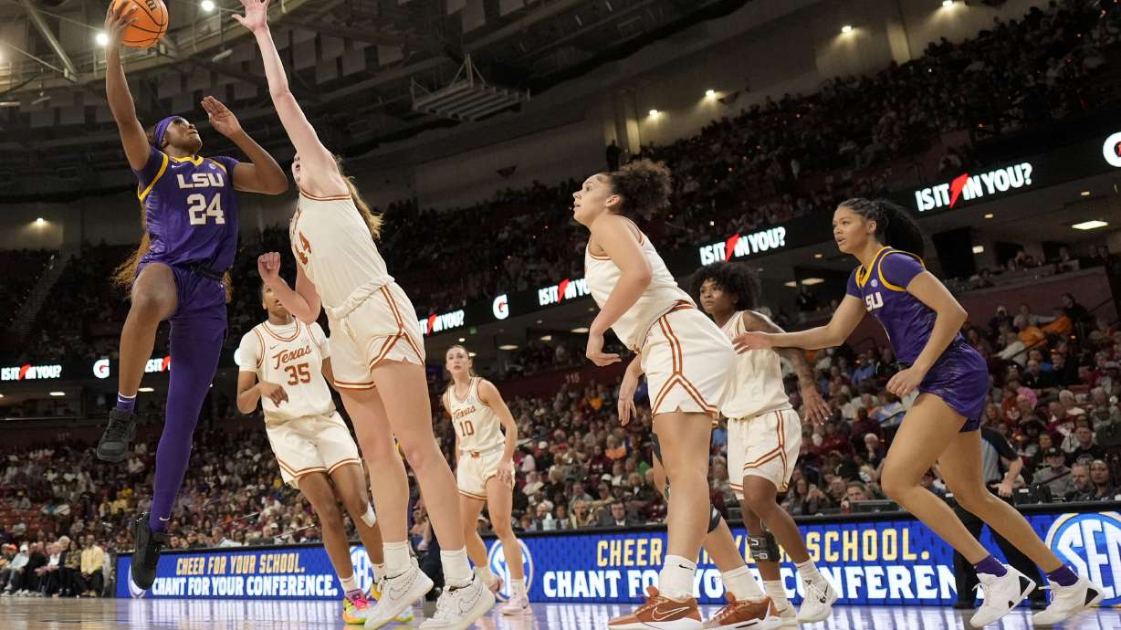 LSU guard Aneesah Morrow shoots over Texas forward Taylor Jones during the first half during of an NCAA college basketball game in the semifinals of the Southeastern Conference tournament, Saturday, March 8, 2025, in Greenville, S.C.