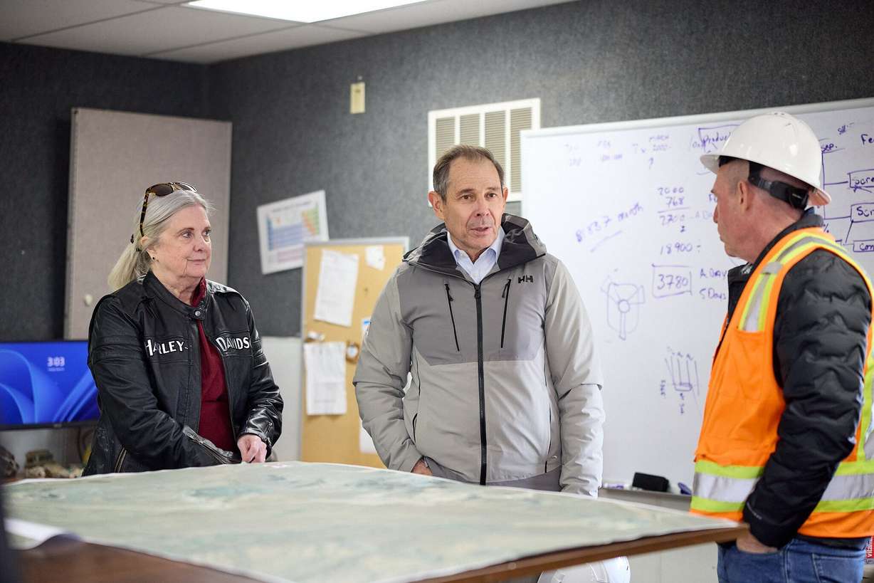 Lorie Fowlke, Sen. John Curtis’ state director, Curtis, and Michael Eggleton, one of the mine shareholder at a recent tour of the facility.