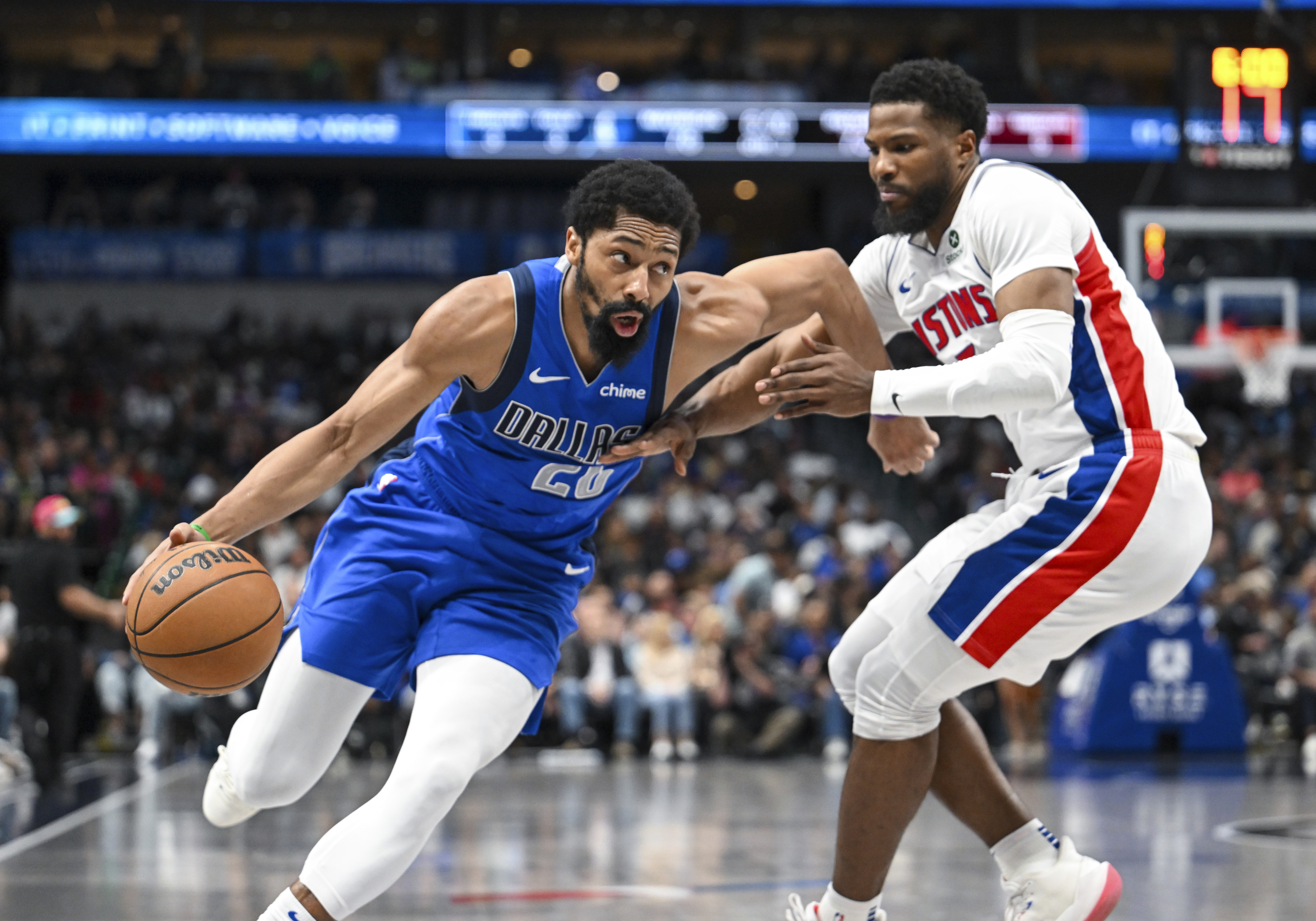 Dallas Mavericks guard Spencer Dinwiddie drives against Detroit Pistons guard Malik Beasley during the second half of an NBA basketball game, Friday, March 21, 2025, in Dallas, Texas.
