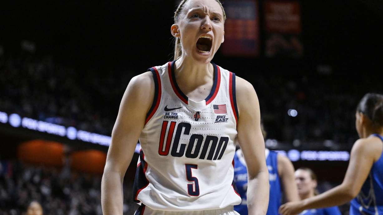 UConn guard Paige Bueckers (5) reacts after making a basket while being fouled during the second half of an NCAA college basketball game against Creighton in the finals of the Big East Conference tournament, Monday, March 10, 2025, in Uncasville, Conn.