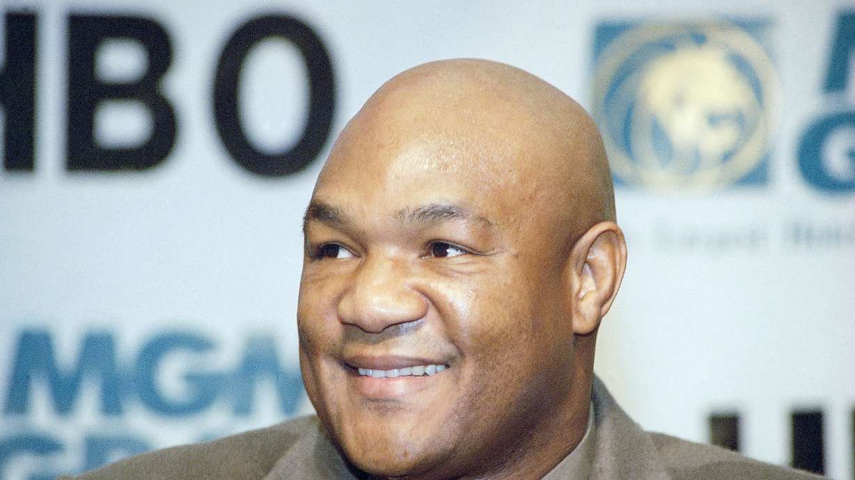 FILE - Former heavyweight champion George Foreman of Houston, reacts during a news conference in Las Vegas, Wednesday, Nov. 2, 1994.
