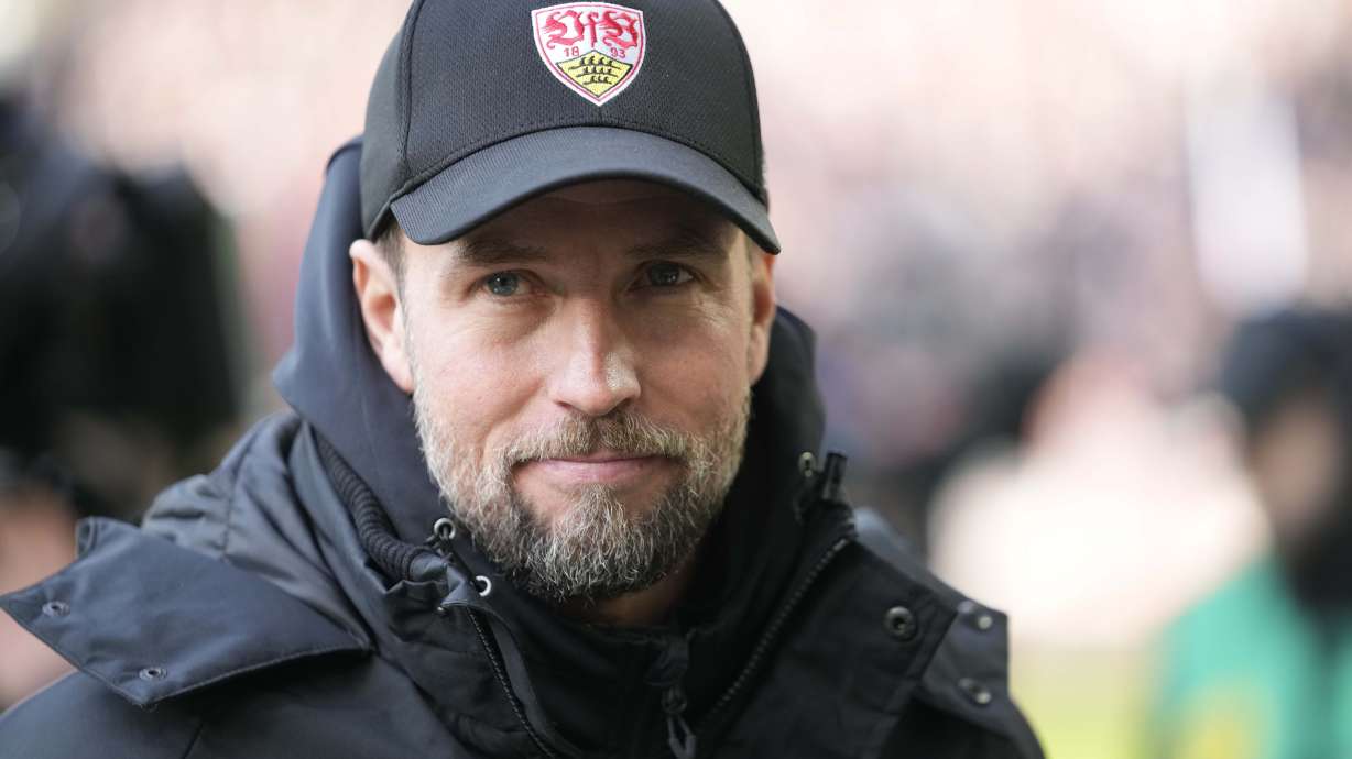 FILE - Stuttgart's head coach Sebastian Hoeness watches prior to the start of the German Bundesliga soccer match between Borussia Dortmund and VfB Stuttgart at the Signal-Iduna Park in Dortmund, Germany, Saturday, Feb. 8, 2025.