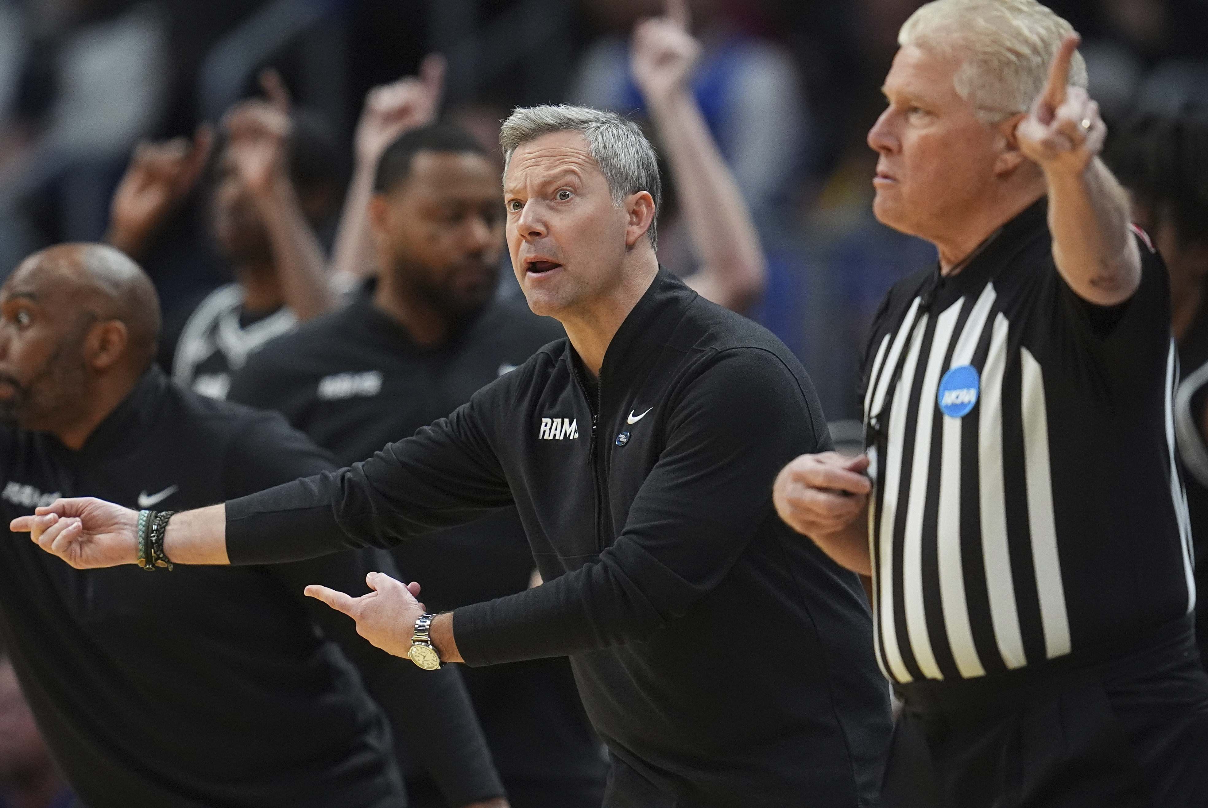 Virginia hires VCU coach Ryan Odom, whose father was a Cavaliers assistant