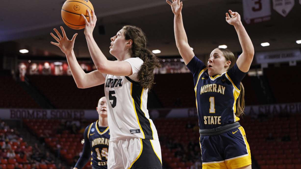 Iowa center Ava Heiden (5) looks to shoot in front of Murray State guard Halli Poock (1) during the first half in the first round of the NCAA college basketball tournament, Saturday, March 22, 2025, in Norman, Okla.