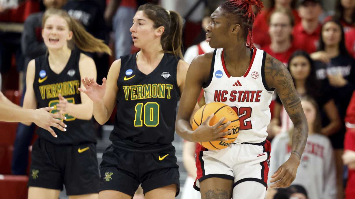 North Carolina State's Saniya Rivers (22) reacts to a call during the first half against Vermont in the first round of the NCAA college basketball tournament in Raleigh, N.C., Saturday, March 22, 2025.