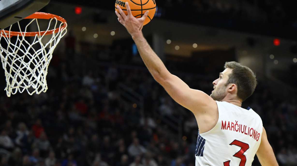 Saint Mary's guard Augustas Marciulionis drives to the basket in the first half against Vanderbilt in the first round of the NCAA college basketball tournament, Friday, March 21, 2025, in Cleveland.