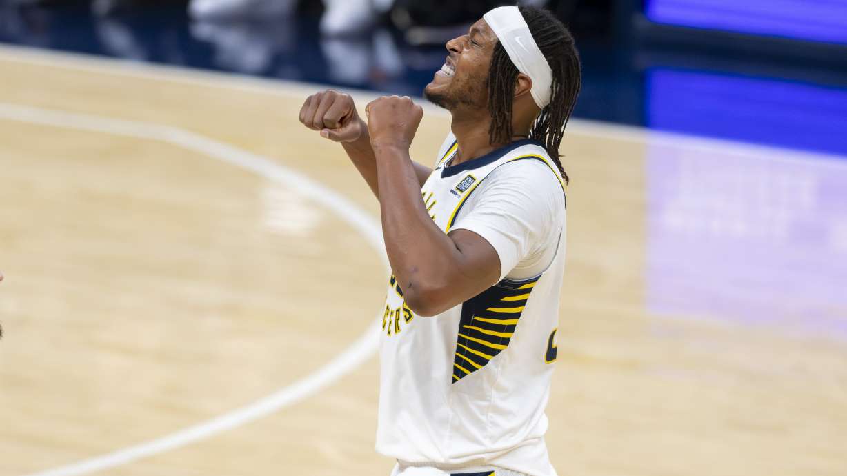 Indiana Pacers center Myles Turner (33) reacts after shooting during the second half of an NBA basketball game against the Brooklyn Nets in Indianapolis, Saturday, March 22, 2025.