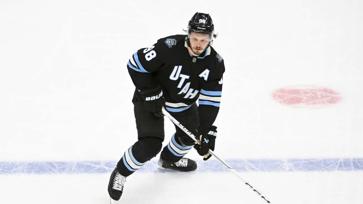 Utah Hockey Club defenseman Mikhail Sergachev (98) skates the puck during the second period of an NHL hockey game against the Anaheim Ducks, Wednesday, March 12, 2025, in Salt Lake City.