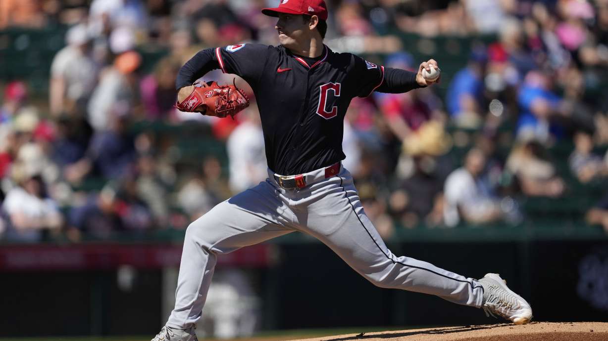 Cleveland Guardians pitcher Logan Allen throws aginst the Los Angeles Angels during the first inning of a spring training baseball game, Wednesday, March 19, 2025, in Tempe, Ariz.